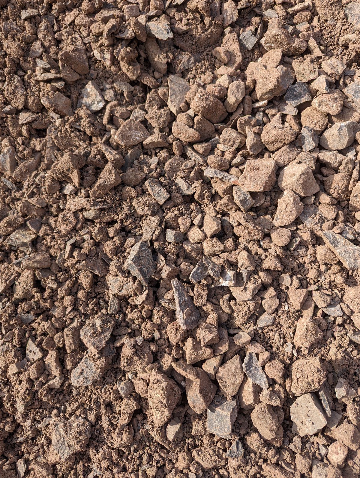 A close up of a pile of rocks and gravel.
