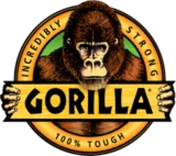 Illustration of a gorilla holding a wooden beam with the text "GORILLA" on it. The outer circle reads "INCREDIBLY STRONG" and "100% TOUGH.